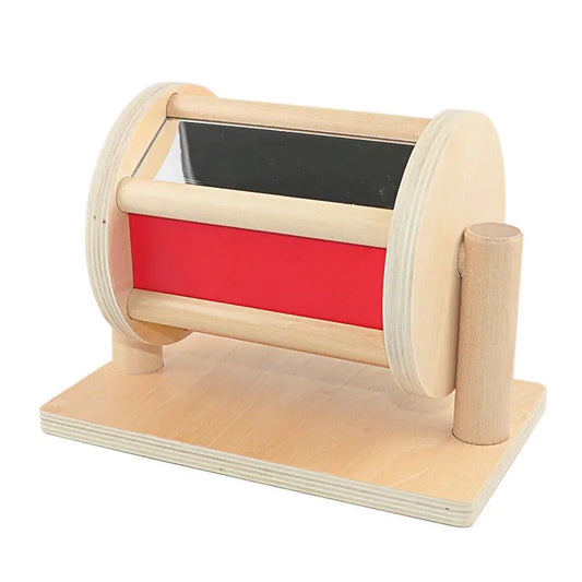 Rotating drum with mirror and ball inside