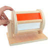 Rotating drum with mirror and ball inside