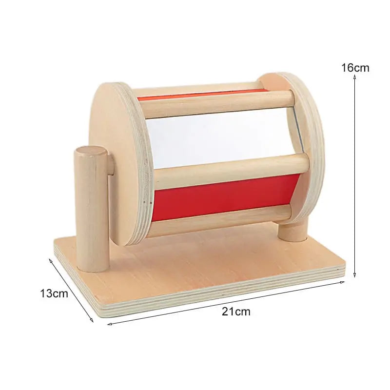 Rotating drum with mirror and ball inside