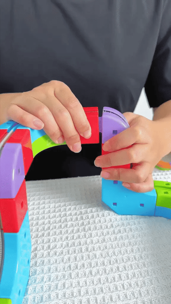 Kid playing with learning flashcard toy MyFirstWords